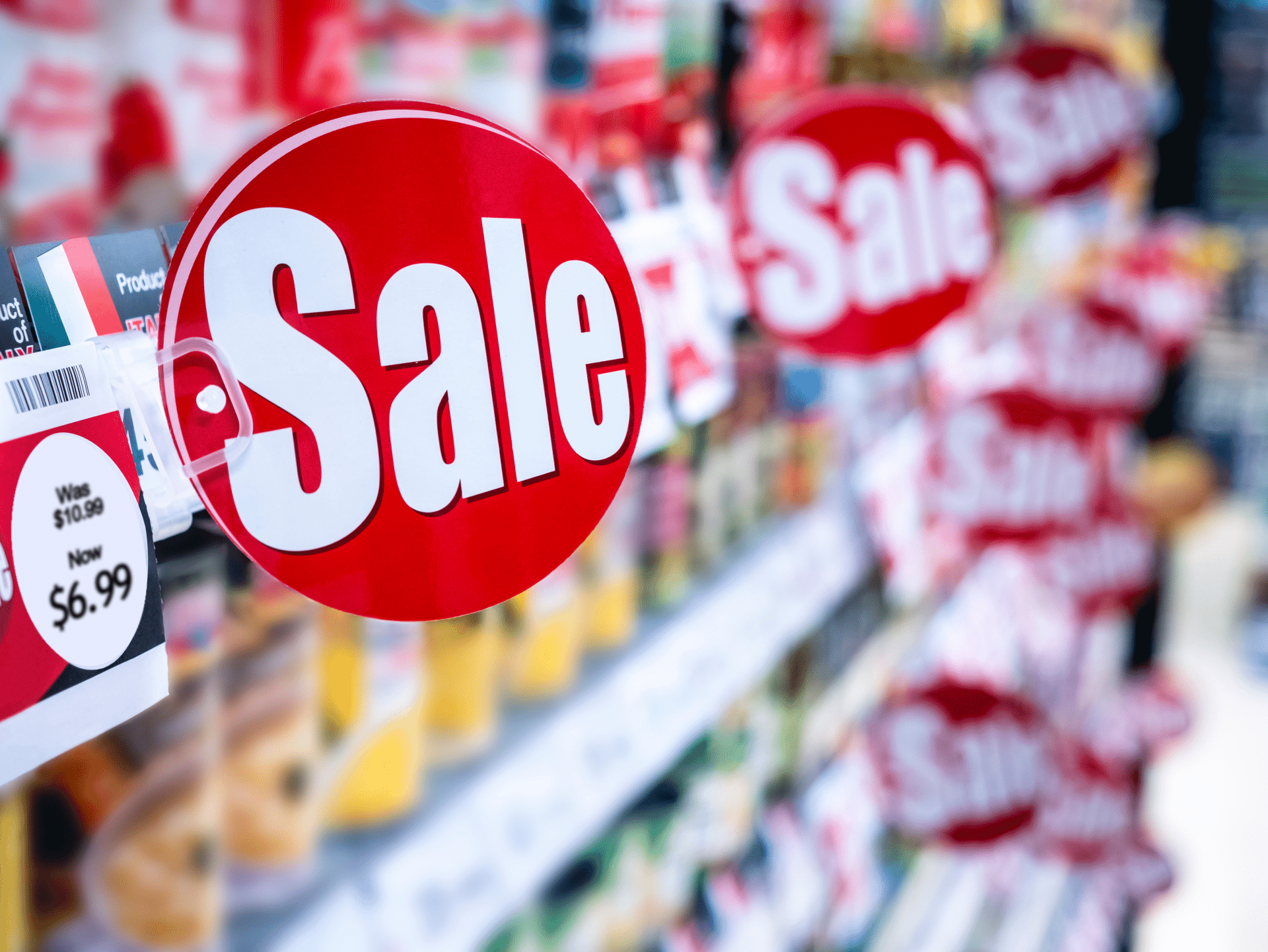 Sale signs on a shopping isle